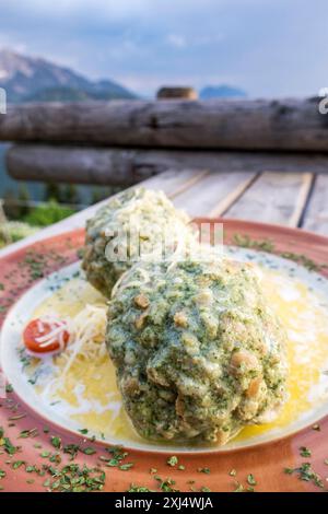 Austrian spinach dumplings on a table Stock Photo