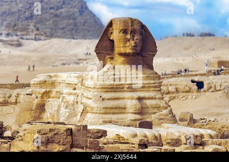 Photo with focus on main subject blurred background of complete full view of Sphinx of Giza from ancient Egyptian time Ancient lion body with human Stock Photo