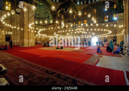 Interior of large prayer room with chandelier under domed vault in Muhammad Ali Mosque Muhammad Ali Mosque from Ottoman times Alabaster mosque Stock Photo