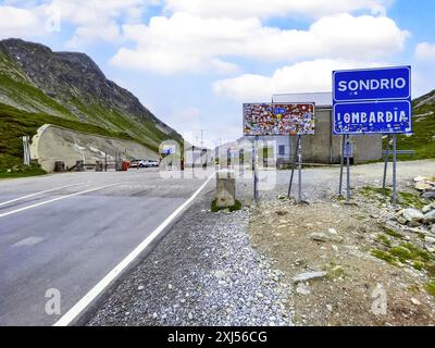 View from Switzerland towards Italy of the former border crossing between Switzerland and Italy at the top of the Spluegen Pass Passo dello Spluga on Stock Photo