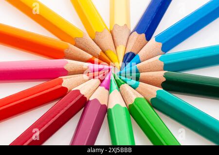 Many different coloured pencils, arranged in a circle, cut-outs, coloured pencils, studio Stock Photo