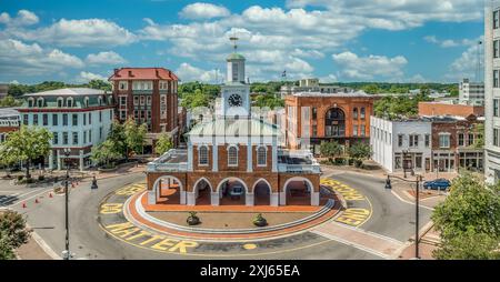 Aerial view of Fayetteville Market House historic colonial brick building with arches in downtown Hay street in the middle of a traffic circle surroun Stock Photo