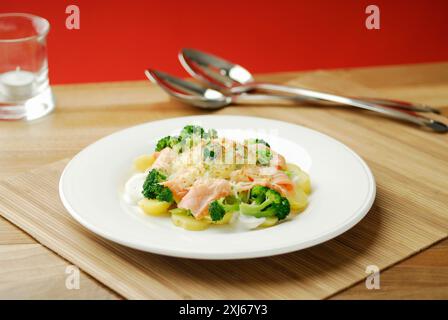 Salmon with potatoes and gratinated broccoli Stock Photo