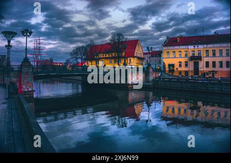 Houses in Old town along the river at Blue hour, Klaipeda, Lithuania Stock Photo