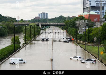 Toronto, Canada. 16th July, 2024. Cars are partially submerged following heavy rainfall in Toronto, Canada on Tuesday, July 16, 2024. (Photo by Michael Chisholm/Sipa USA) Credit: Sipa USA/Alamy Live News Stock Photo