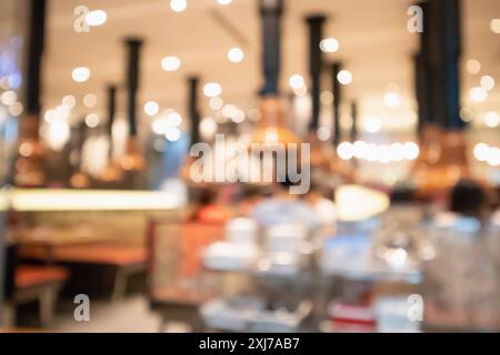 Korean barbecue grill restaurant interior blur background with bokeh light Stock Photo