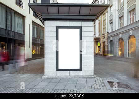Blank Mockup Of Vertical Street Poster Billboard In City Street. Front View Stock Photo