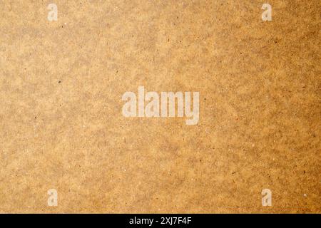 A brown background with a white line. The background is made of wood and the white line is made of paper Stock Photo