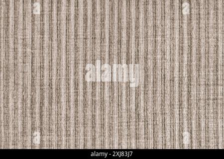 Ridge texture background of velour corduroy brown cloth. Large ribbed, coarse weaving velveteen, striped  upholstery texture fabric, furniture textile Stock Photo