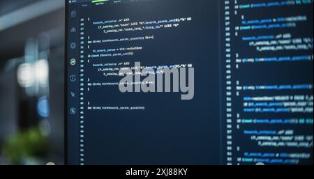 Close Up Focus on Desktop Computer Screen. Digital Display Showing Coding Language User Interface. Software Engineer Programming Innovative e-Commerce Software in Office Stock Photo