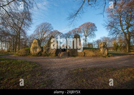 Wayland's Smithy is an atmospheric historic site about a mile's walk along the Ridgeway from the Uffington White Horse. A Neolithic chambered long barrow, it was once believed to have been the home of Wayland, the Saxon god of metal working. Stock Photo