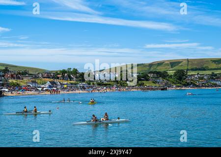 People in kayaks on Swanage Bay, Swanage, Dorset, England Stock Photo