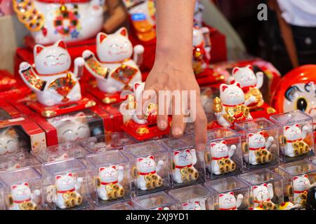 Traditional Waving Cat Statues, Also Known as Maneki-neko Stock Photo