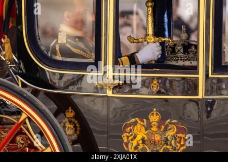 London, UK. 17th July, 2024. State Opening of Parliament; Sovereign's Procession in Whitehall with HM King Charles III The Sword of State and the Imperial State Crown Credit: Ian Davidson/Alamy Live News Stock Photo