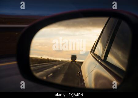 Side mirror reflection of semi-truck on Interstate 90, WA, USA Stock Photo