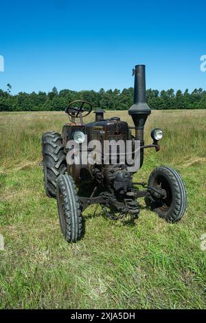 Historic Lanz Bulldog Tractor. The Lanz Bulldog was a tractor manufactured by Heinrich Lanz AG in Mannheim, Baden-Wuerttemberg, Germany. Stock Photo