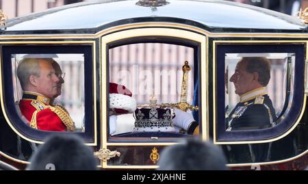 Westminster, London, UK. 17th July, 2024. King Charles III attends the State Opening of Parliament and presents The King’s Speech, formally marking the new session of Parliament. The ceremony is surrounded by pomp, tradition and colour. State Regalia travels by carriage to and from Parliament for the ceremony. Credit: Malcolm Park/Alamy Live News Stock Photo