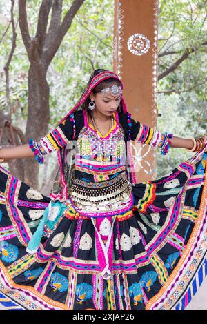 young indian girl in traditional rajasthani attire with blurred background from different angle Stock Photo