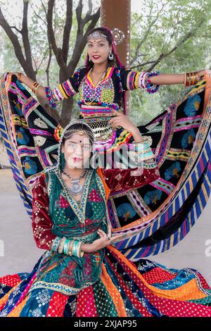 young indian girl in traditional rajasthani attire with blurred background from different angle Stock Photo