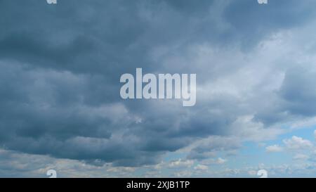 Time lapse. Nature storm cloud in the cloudy sky. Moving rain clouds after bad weather. Stock Photo