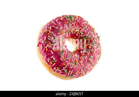 Pink donut with colorful sprinkles isolated on white background with clipping path Stock Photo