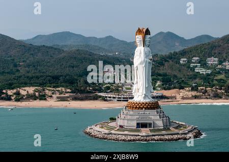 Stock image of the White GuanYin statue in Nanshan Buddhist Cultural Park, Sanya, Hainan Island, China. Ariel high resolution image taken from a helic Stock Photo