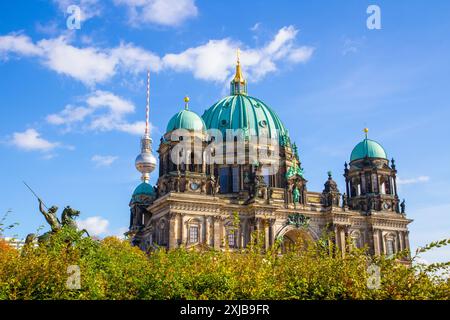 Berlin Cathedral, also known as the Evangelical Supreme Parish and Collegiate Church with TV Tower in the background. Berlin, Germany. Stock Photo