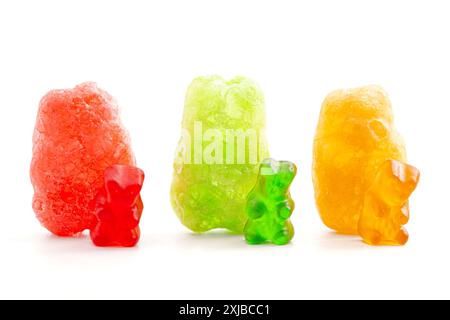 Three Freeze Dried Gummy Bear Shaped Candies Isolated on a White Background Stock Photo