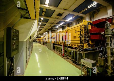 Experimental equipment of hadron collider in long corridor. Stock Photo