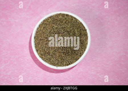 Black Cumin seeds are kept on a tray. Stock Photo