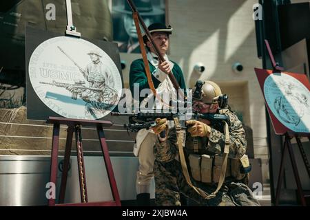 U.S. Marine reenactors pose for a photo after the U.S. Mint unveiling of the new trio of commemorative coins dedicated to the 250-year anniversary of the U.S. Marine Corps at the National Museum of the Marine Corps, Virginia, July 17, 2024. The coins are a testament to the courage, sacrifice and dedication of all Marines, ensuring that their stories will be remembered and celebrated. (U.S. Marine Corps photo by Lance Cpl. Joaquin Dela Torre) Stock Photo