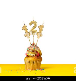 Cupcake with birthday candle - Candle number 121 Stock Photo