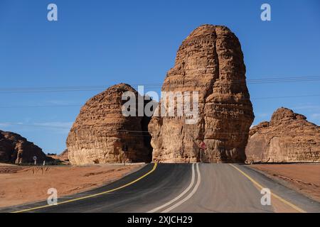 Al Ula, Saudi Arabia: Point of view of a car driving on the road through the Al Ula area, famous for its archeological sites in the desert of Saudi Ar Stock Photo