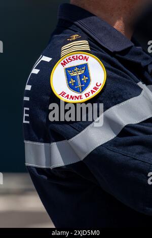 Toulon, France. 16th July, 2024. The Joan of Arc Misson logo on the sleeve of an officer's uniform in Toulon, France, July 16, 2024. Photo by Laurent Coust/ABACAPRESS.COM Credit: Abaca Press/Alamy Live News Stock Photo