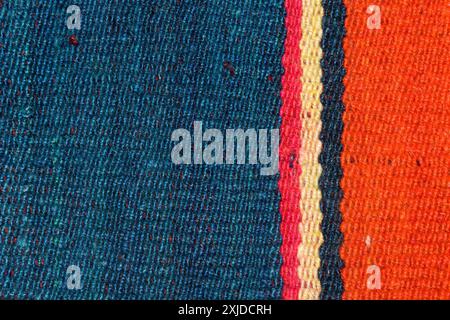Blue, red, yellow, orange colorful stripes on textile Stock Photo