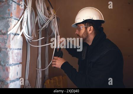 Electrician at Work. Stock Photo