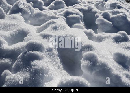 Big snow crystals shining in the sunlight. Stock Photo