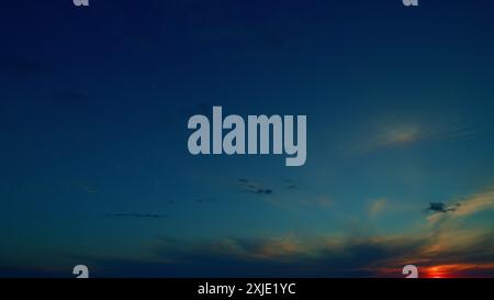 Time lapse. Sun halo. Colorful evening sunset sky with pastel red ...