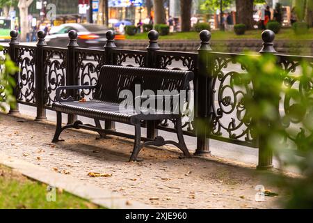 Cast iron bench on Rustaveli Avenue in Tbilisi, Georgia. Stock Photo