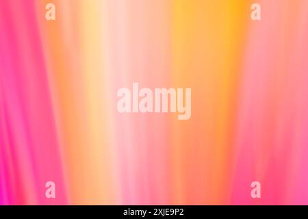 Abstract background banner with smooth vertical lines rays of pink, orange and yellow colors with a gradient. Backdrop Stock Photo