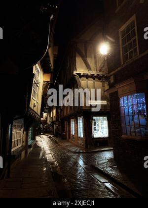 The medieval narrow street of the Shambles and Little Shambles street late in the evening, York, Yorkshire, England Stock Photo