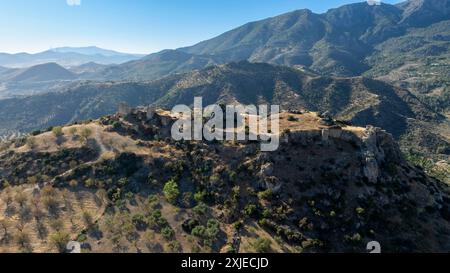 aerial view of the ruins of the castle of Turon in the municipality of Malaga, Andalusia. Stock Photo