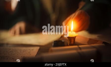 Close Up of Inscriptions and Notes With Hand of Old Renaissance Male Using Ink and Quill to Write New Ideas. Dedicated Historian Taking Notes, Inventing New Theories, Innovating Stock Photo