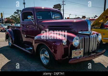 Gulfport, MS - October 01, 2023: High perspective front corner view of a 1946 Ford Jailbar Pickup Truck at a local car show. Stock Photo