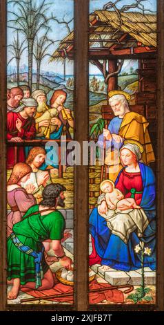 PERUGIA, ITALY - MAY 16, 2024: The stained glass of Adoration of Shepherds in the church Cattedrale di San Lorenzo (St. Lawrece cathedral) Stock Photo