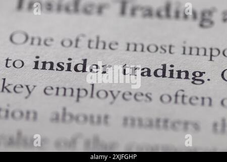 insider trading printed in text on page as visual aid or business law reference Stock Photo