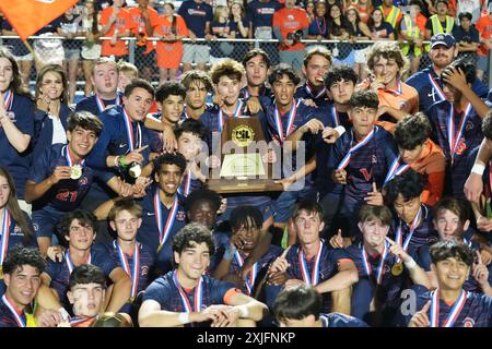 Seven Lakes players celebrate a 2-1 victory over Lewisville Flower Mound after a high school soccer state championship game. ©Bob Daemmrich Stock Photo