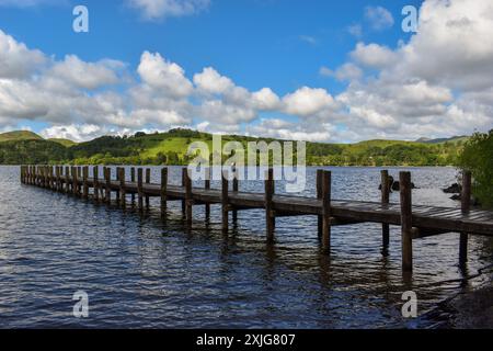 A wooden jetty out onto Coniston water. Stock Photo