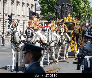 London, UK 17th Jul 2024. King Charles and Queen Camilla ride in the Diamond Jubilee State Coach along Whitehall for the State Opening of Parliament Stock Photo