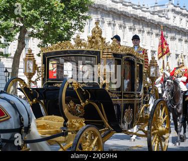 London, UK 17th Jul 2024. King Charles and Queen Camilla ride in the Diamond Jubilee State Coach along Whitehall for the State Opening of Parliament Stock Photo